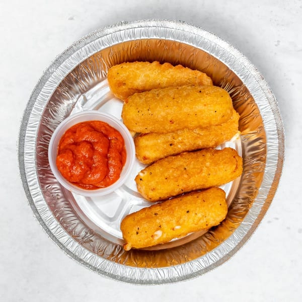 Golden-brown mozzarella sticks and a side of red marinara sauce in a foil takeout container.